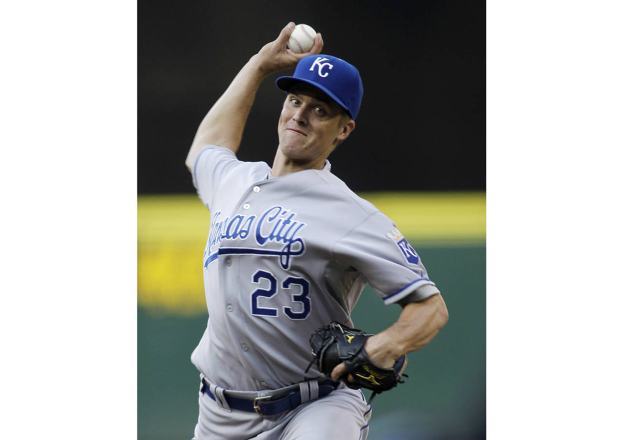 FILE - Kansas City Royals starting pitcher Zack Grienke throws against the Seattle Mariners in the ...