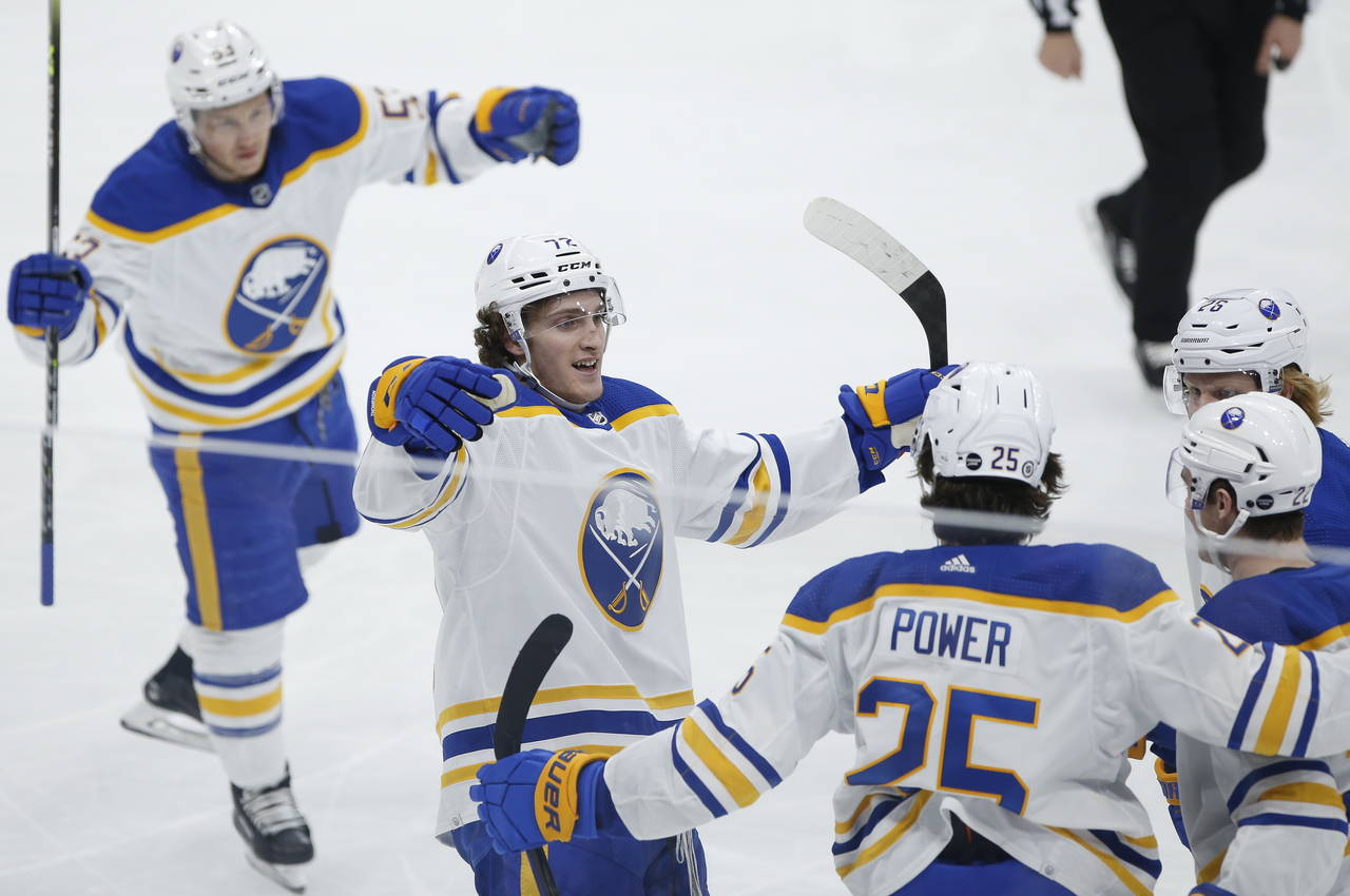 Buffalo Sabres' Jeff Skinner (53), Tage Thompson (72), Owen Power (25), Jack Quinn (22) and Rasmus ...