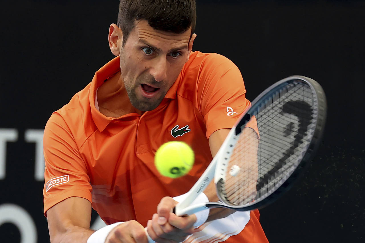 Serbia's Novak Djokovic makes a backhand return to France's Constant Lestienne during their Round o...
