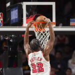 Murray's 28 help hot-shooting Hawks hold off Heat, 121-113