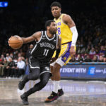 Irving has 26, Nets beat Lakers 121-104 as James, Davis sit