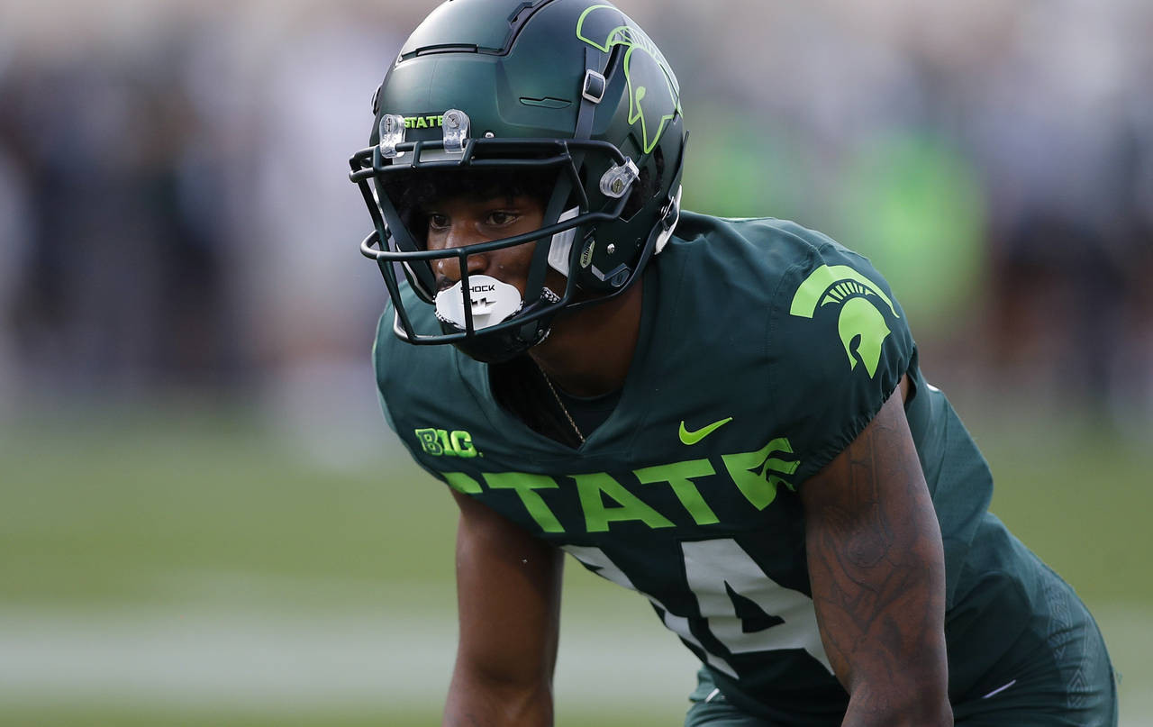 FILE - Michigan State's Khary Crump waits for a play to begin during the team's NCAA college footba...