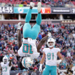 Dugger INT return helps lift Pats over fading Dolphins 23-21