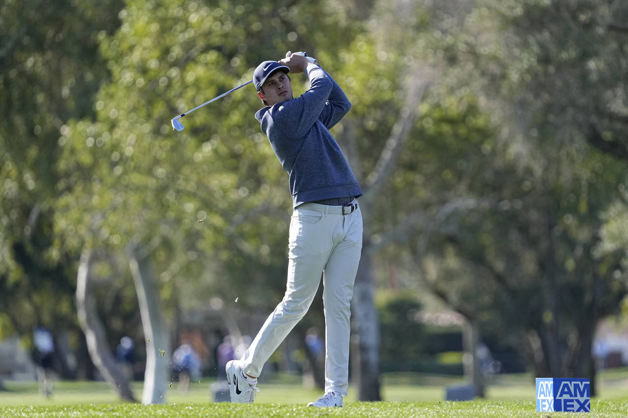 Davis Thompson hits from the 15th tee during the American Express golf tournament on the La Quinta ...
