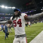 Giants outlast Vikings 31-24 for 1st playoff win in 11 years