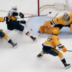 Thomas, Saad spark Blues in 5-2 win over Predators