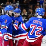 Rangers score 3 in 3rd to stop Hurricanes' win streak at 11