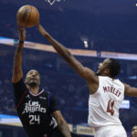 Osman ties career high with 29 points, Cavs rout Clippers