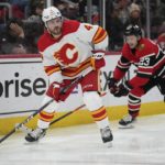 Domi scores in OT to lift Blackhawks over Flames 4-3