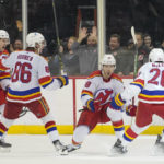 Devils rally from 2 down, beat Rangers on Severson's OT goal