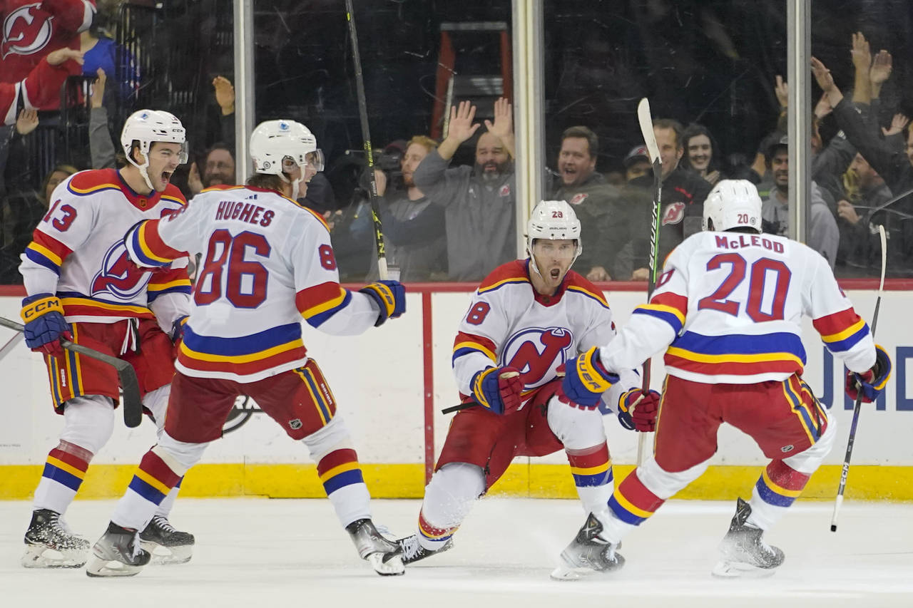 New Jersey Devils defenseman Damon Severson (28) celebrates after scoring the game-winning goal in ...
