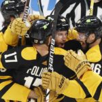 Grzelcyk breaks tie late, Bruins beat Maple Leafs 4-3