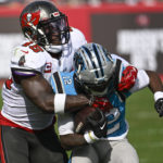 Brady, Bucs rally to beat Panthers 30-24, clinch NFC South