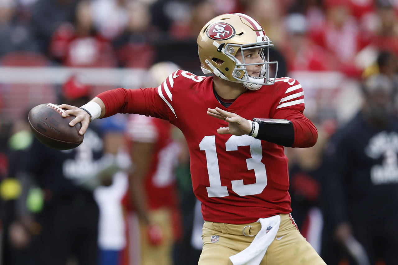 San Francisco 49ers quarterback Brock Purdy (13) passes against the Arizona Cardinals during the se...
