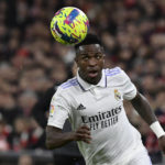 Atletico fans hang Vinícius figure off bridge ahead of derby