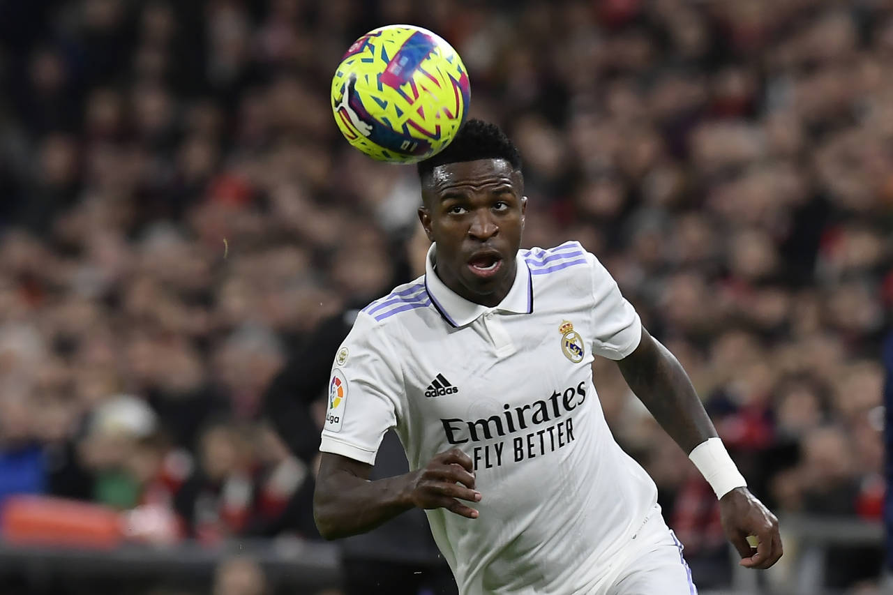 Real Madrid's Vinicius Junior controls the ball during the Spanish La Liga soccer match between Ath...