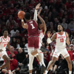 Dunn scores 16, Temple defeats No. 1 Houston 56-55