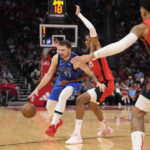 Doncic scores 39, Mavs rally for 111-106 over Houston