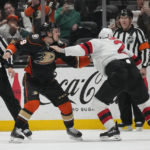Hughes, Bratt lead Devils' 6-2 rout of Ducks