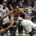 Victor Oladipo scores 26 points, Heat beat Suns 104-96