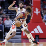 Garland scores 26 as Cavaliers race past Rockets 113-95