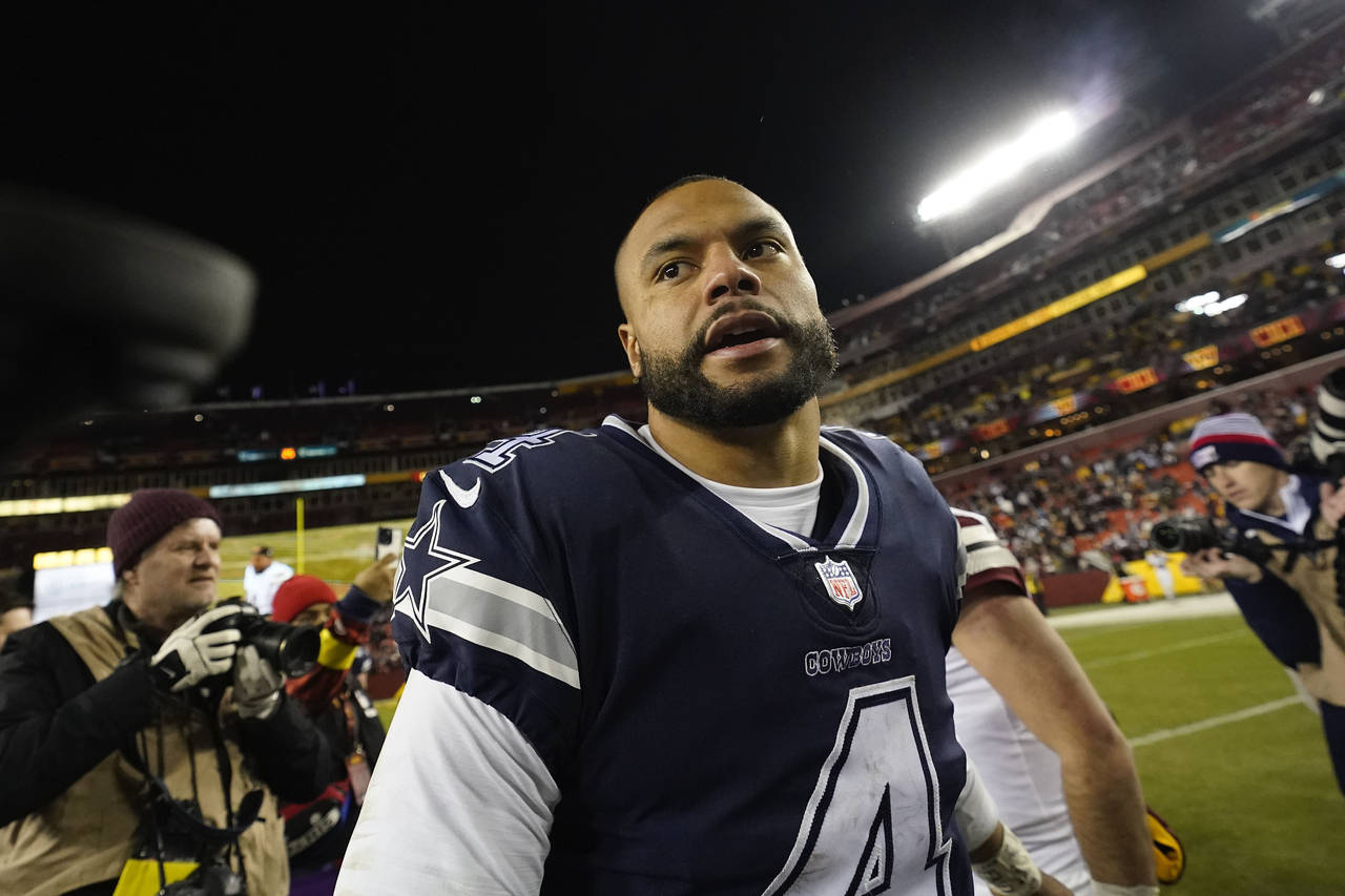 Dallas Cowboys quarterback Dak Prescott (4) leaving the field at the end of an NFL football game ag...