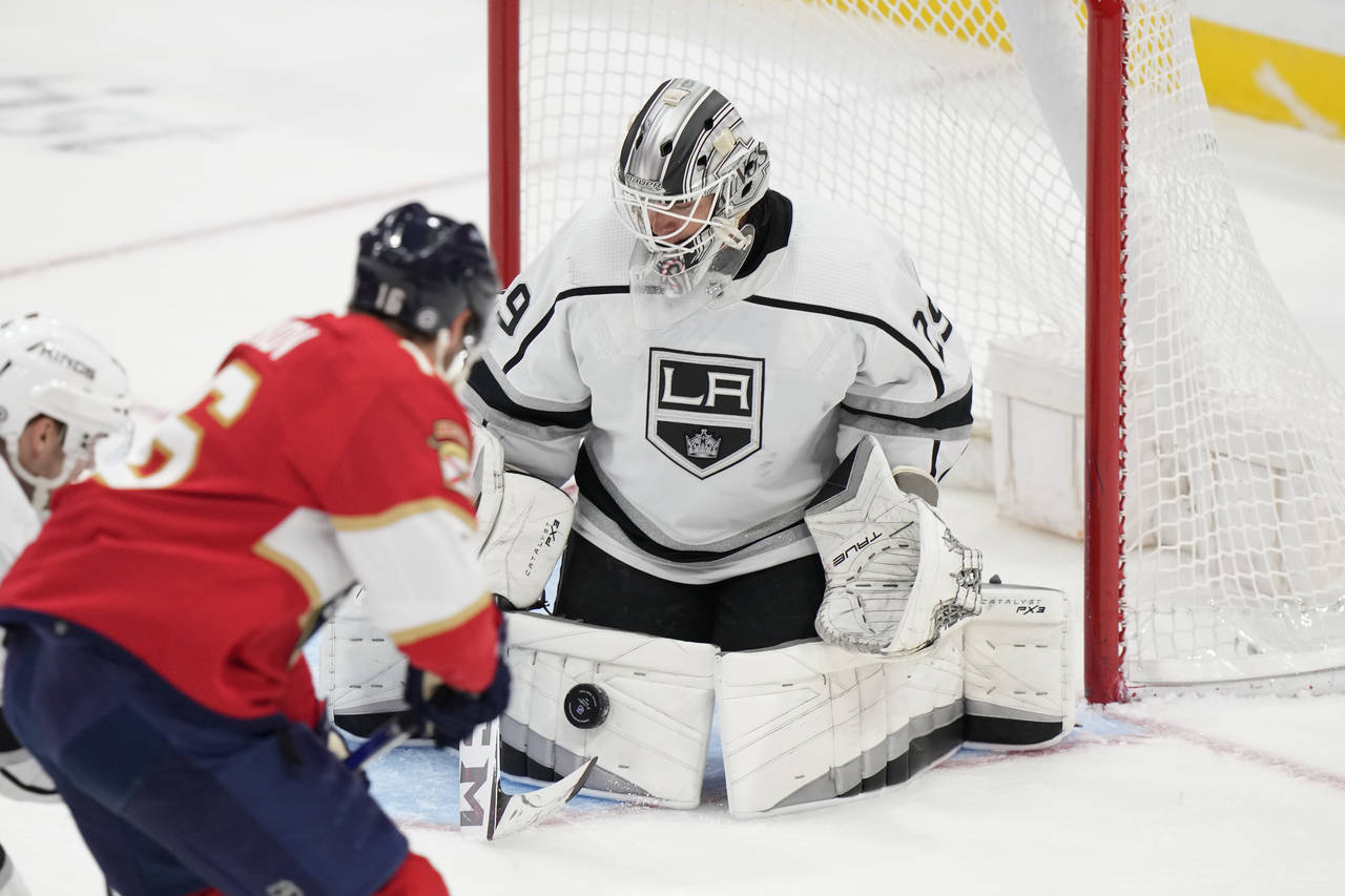 Florida Panthers center Aleksander Barkov (16) attempts a shot at Los Angeles Kings goaltender Pheo...