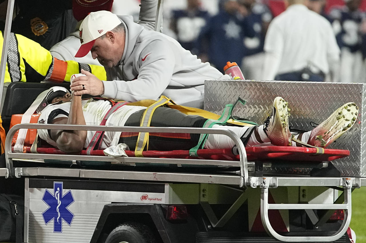 Tampa Bay Buccaneers wide receiver Russell Gage is taken off the filed after being injured against ...
