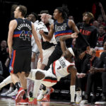 Grant scores 36, Blazers rout Pistons in Payton's debut