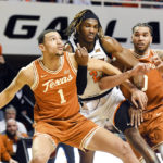 Carr, tough defense lead No. 6 Texas past Oklahoma St. 56-46