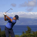 Morikawa pulls away with late run of birdies at Kapalua