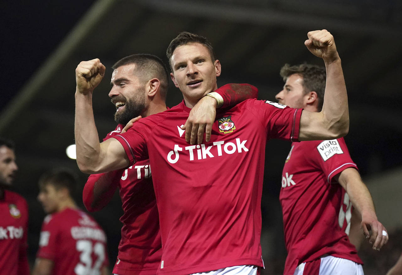 Wrexham's Paul Mullin celebrates scoring against Sheffield United during the English FA Cup fourth ...
