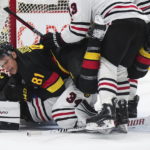 Canucks beat Blackhawks 5-2 in Tocchet's debut as coach