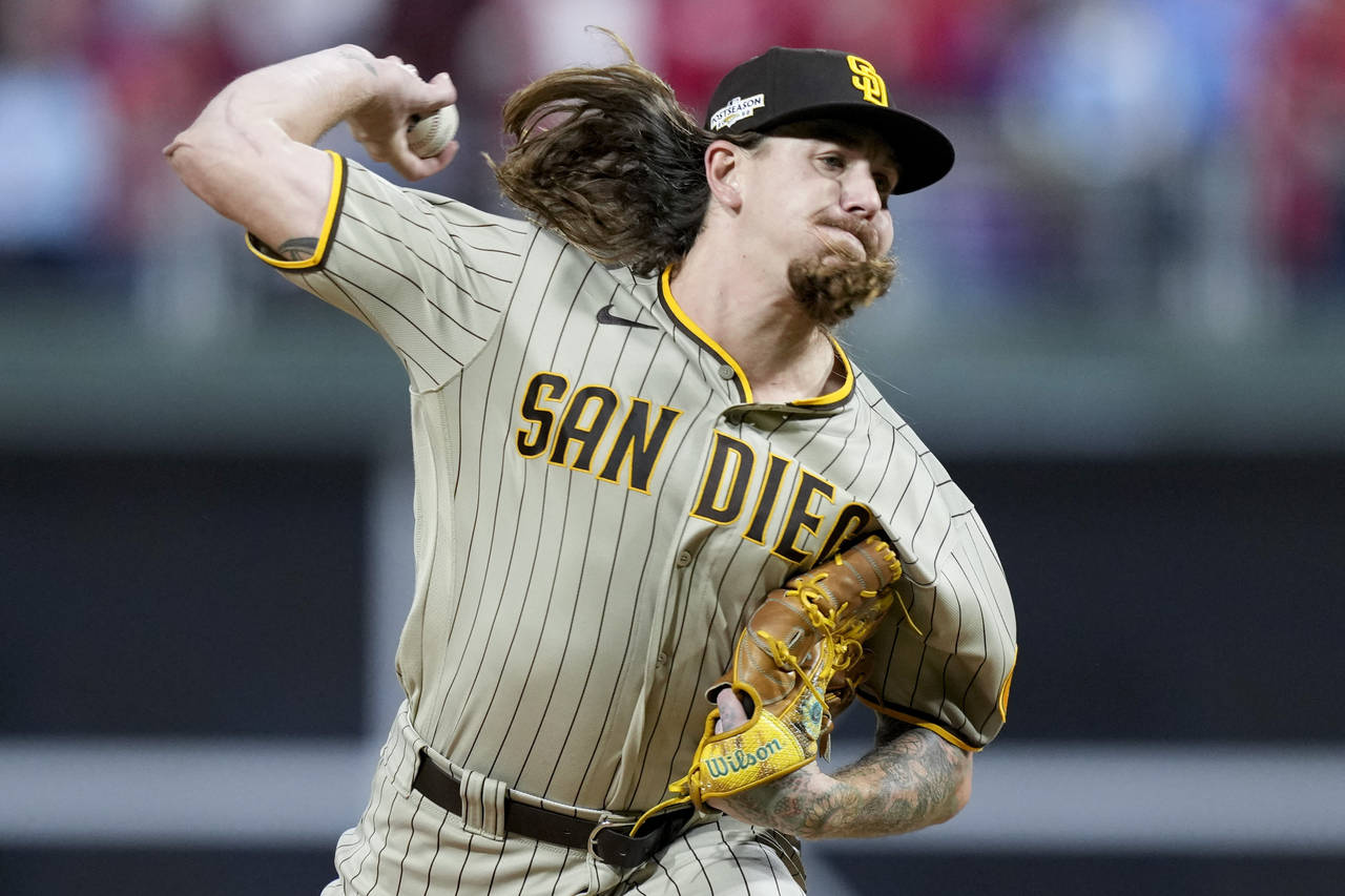 FILE -San Diego Padres starting pitcher Mike Clevinger throws during the first inning in Game 4 of ...