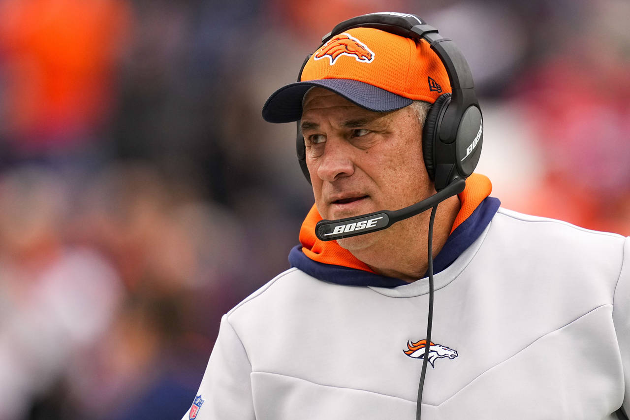FILE - Denver Broncos head coach Vic Fangio looks on during an NFL football game against the Kansas...