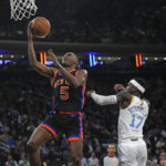 James has triple-double, leads Lakers past Knicks in OT