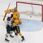Thomas, Saad spark Blues in 5-2 win over Predators