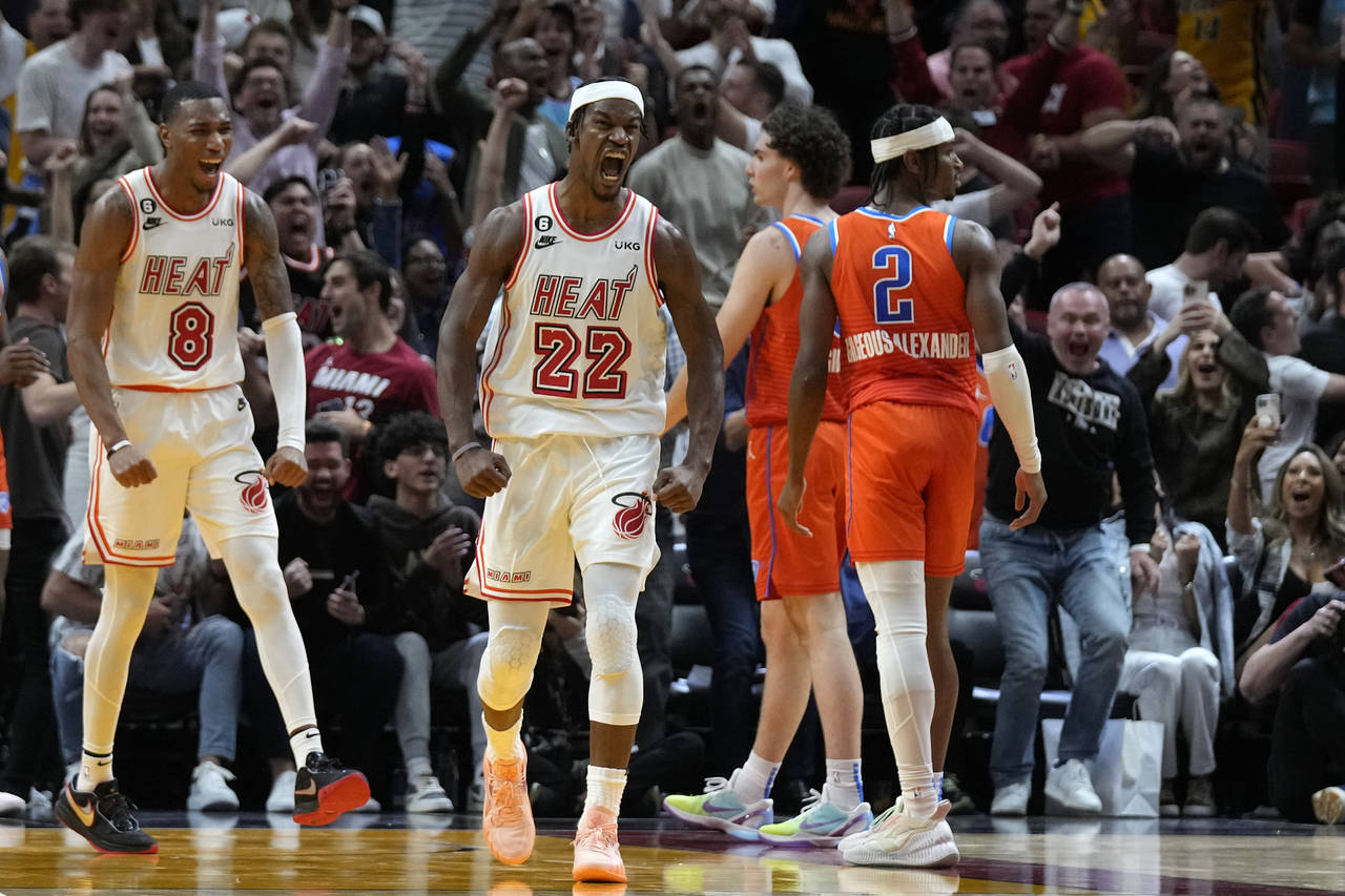 Miami Heat forward Jimmy Butler (22) celebrates after scoring during the final seconds of the secon...