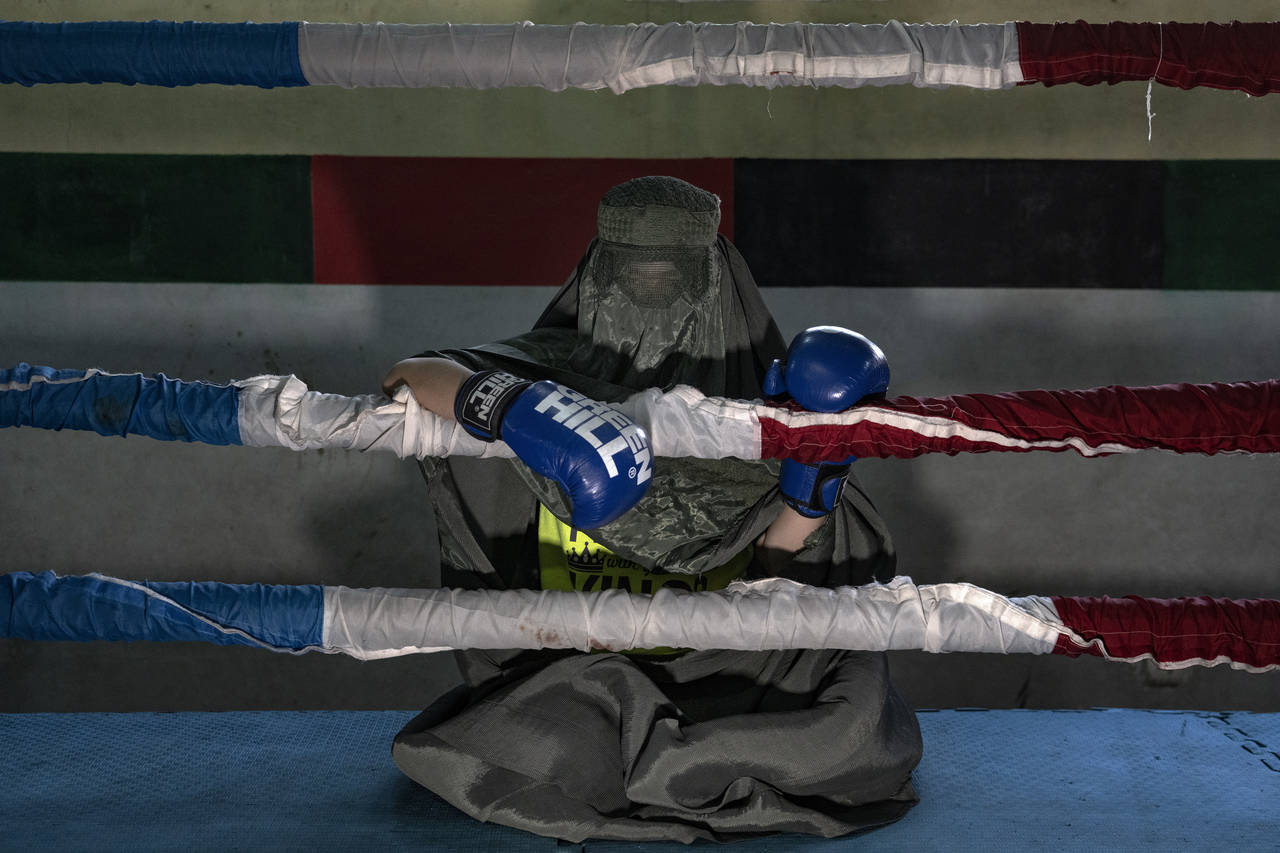 Afghan woman boxer poses for a photo in Kabul, Afghanistan, Saturday, Oct. 29, 2022. The ruling Tal...