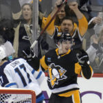 Scheifele scores twice as Jets race by Penguins 4-1