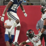 Prescott outshines Brady, Cowboys dominate Buccaneers 31-14