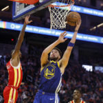 Thompson's season-best 54 leads Warriors past Hawks in 2OT