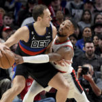 Grant scores 36, Blazers rout Pistons in Payton's debut