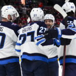 Scheifele, Hellebuyck carry Jets past Senators, 5-1