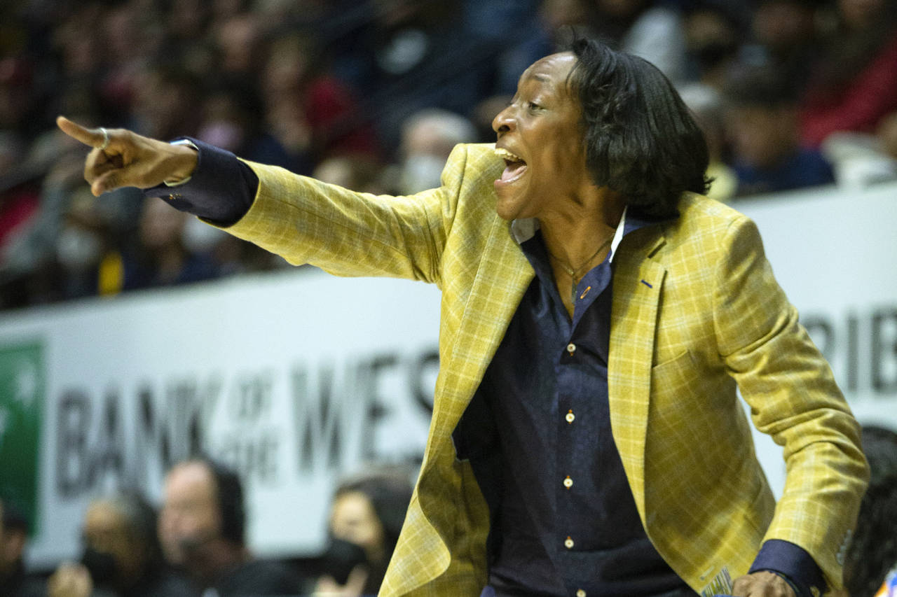 California head coach Charmin Smith shouts instructions to her players during the first half of an ...