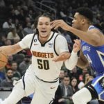 Antetokounmpo helps Bucks beat short-handed Nuggets 107-99
