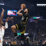 Bridges leads undermanned Suns past Curry, Warriors 125-113