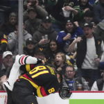 Canucks beat Blackhawks 5-2 in Tocchet's debut as coach