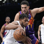 Ayton has 35, Suns hold off Thomas, Nets in Booker's return