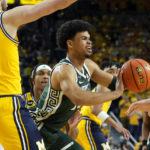 Spartans lose to Michigan in their first game since shooting